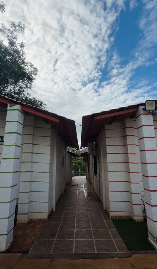 Covered walkway between the cottage units