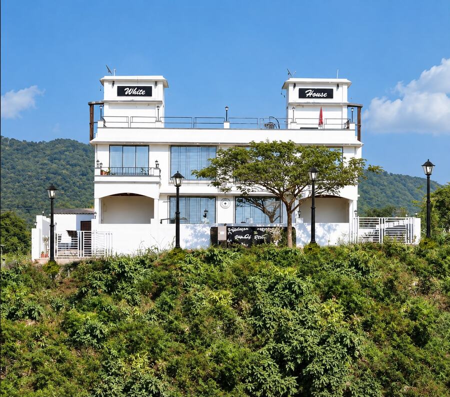 Resort grounds among orchards and hills, good for nature walks and photography